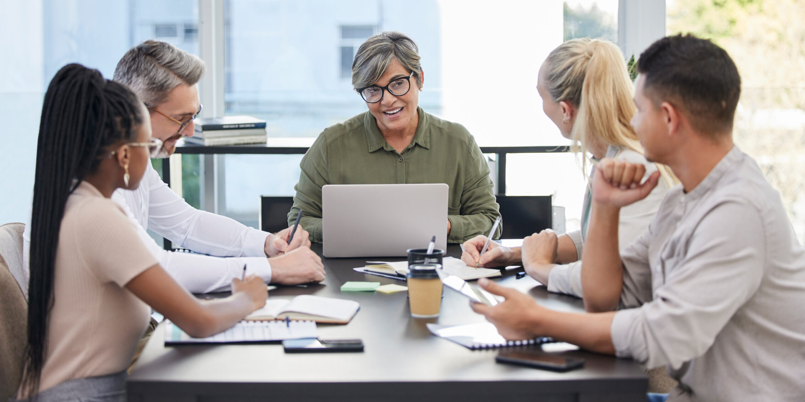 Im really loving this feedback. Shot of a team of business people having a meeting.
